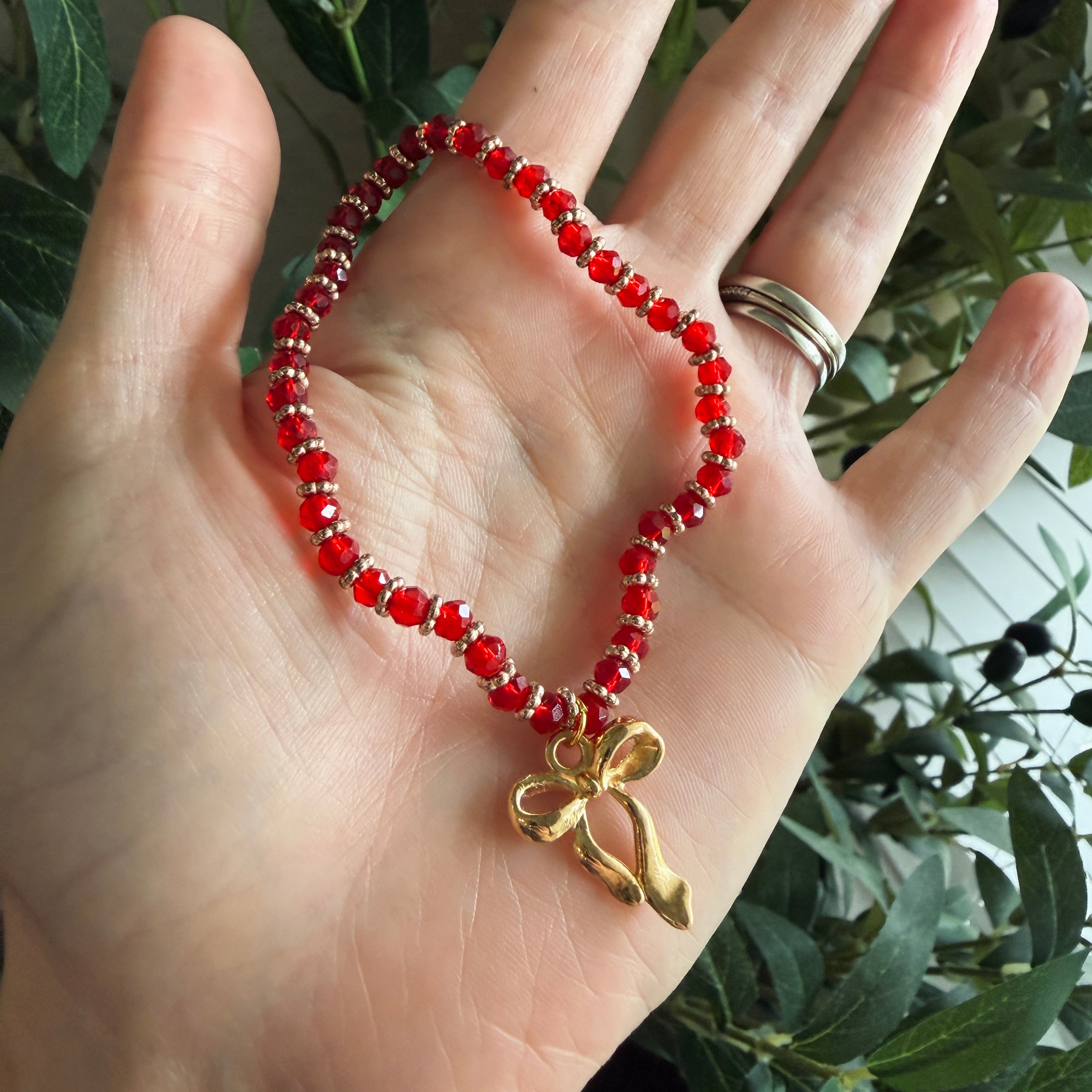 “More Precious Than Rubies” Handmade Glass Bead Stretch Bracelet with Bow Charm