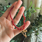 “More Precious Than Rubies” Handmade Glass Bead Stretch Bracelet with Bow Charm
