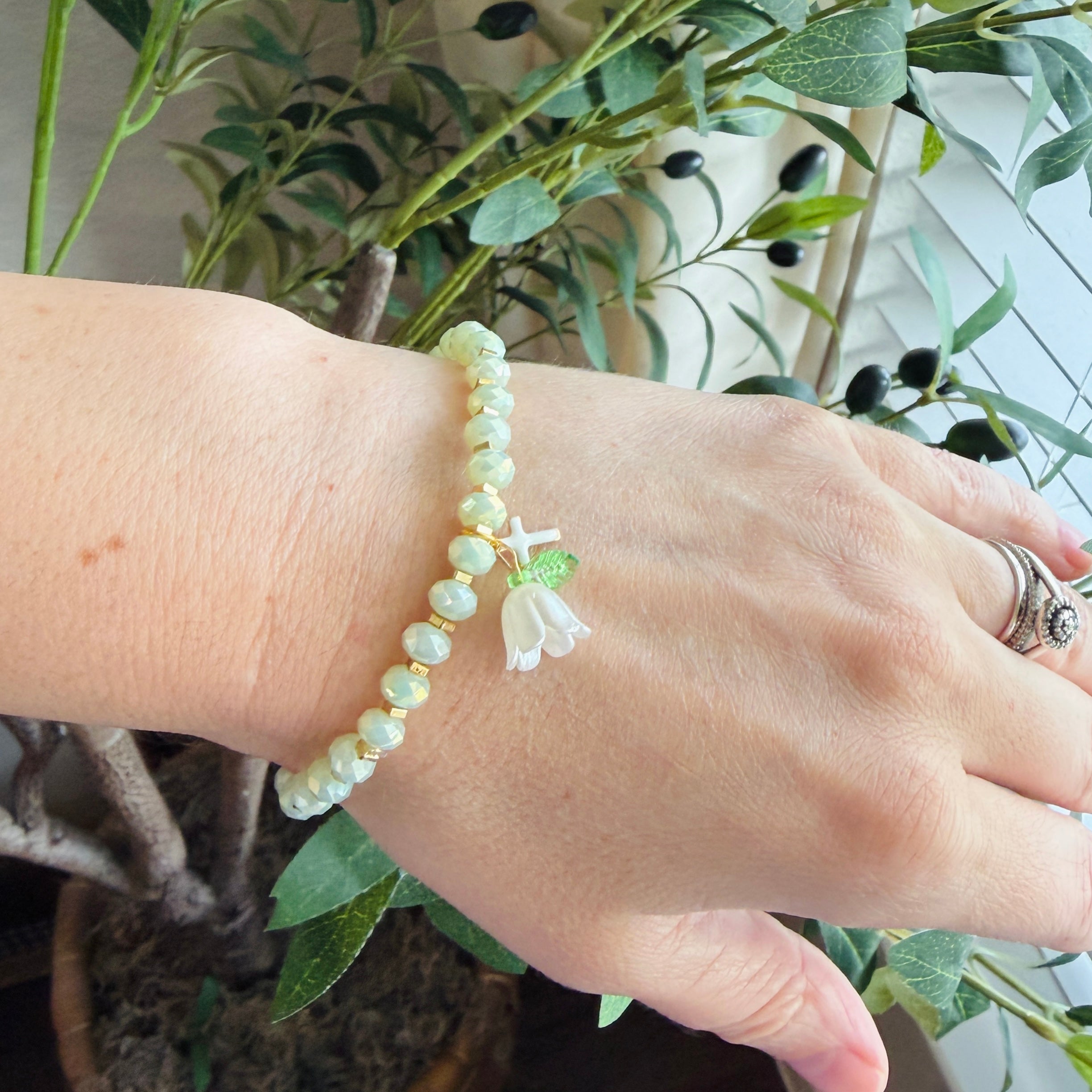“Consider the Lillies” Handmade Glass Bead Stretch Bracelet with Flower and Mini Cross Charm