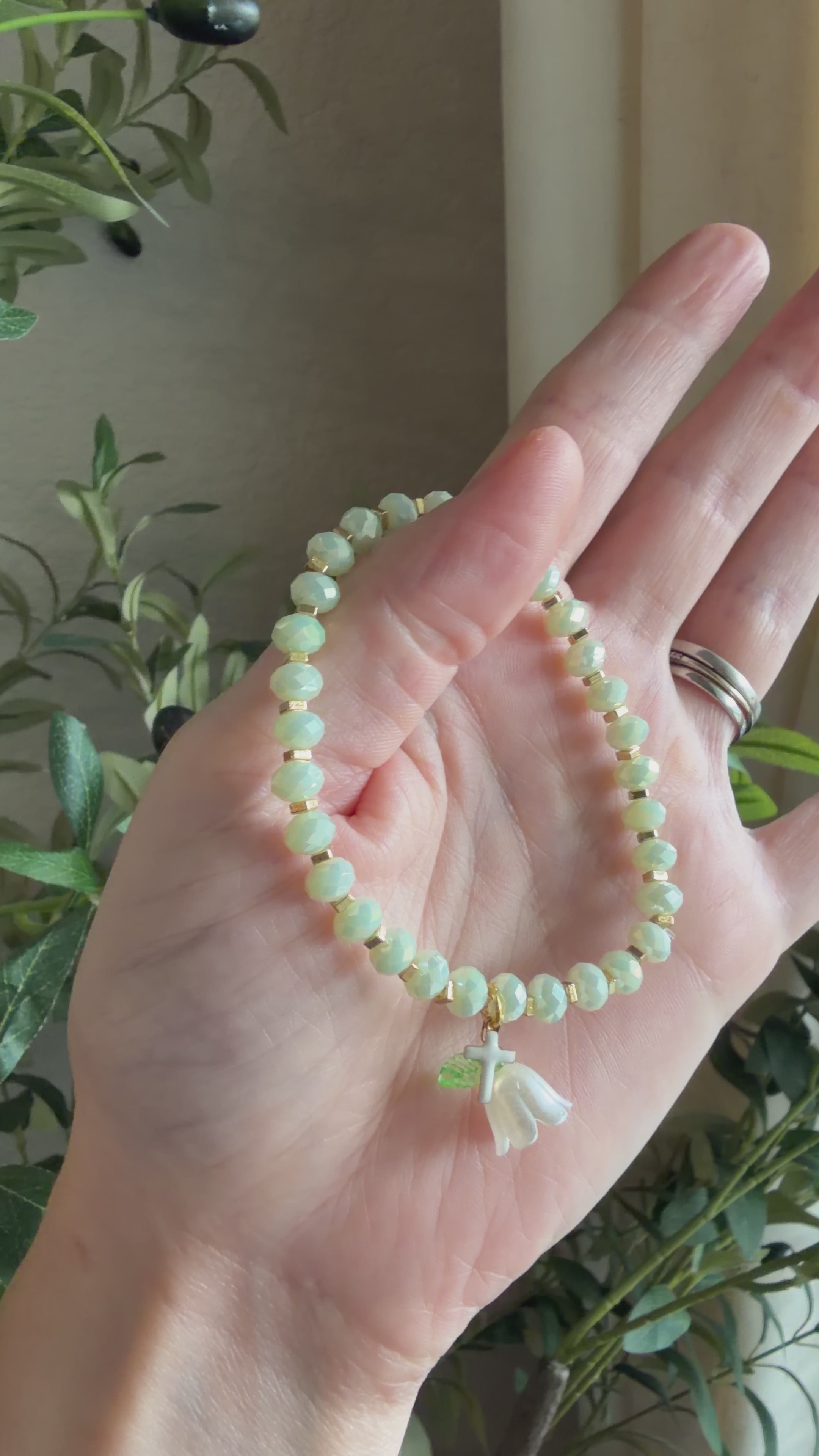 “Consider the Lillies” Handmade Glass Bead Stretch Bracelet with Flower and Mini Cross Charm